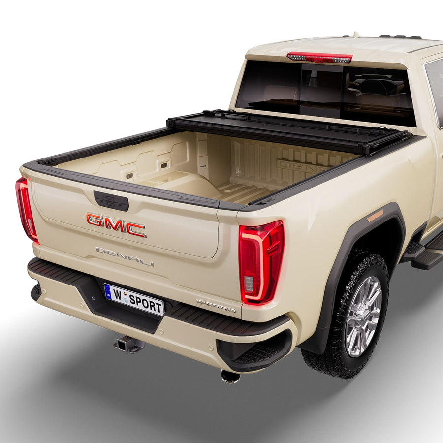 Worksport NEXUS hard folding tonneau cover with its panels partly folded toward the cab