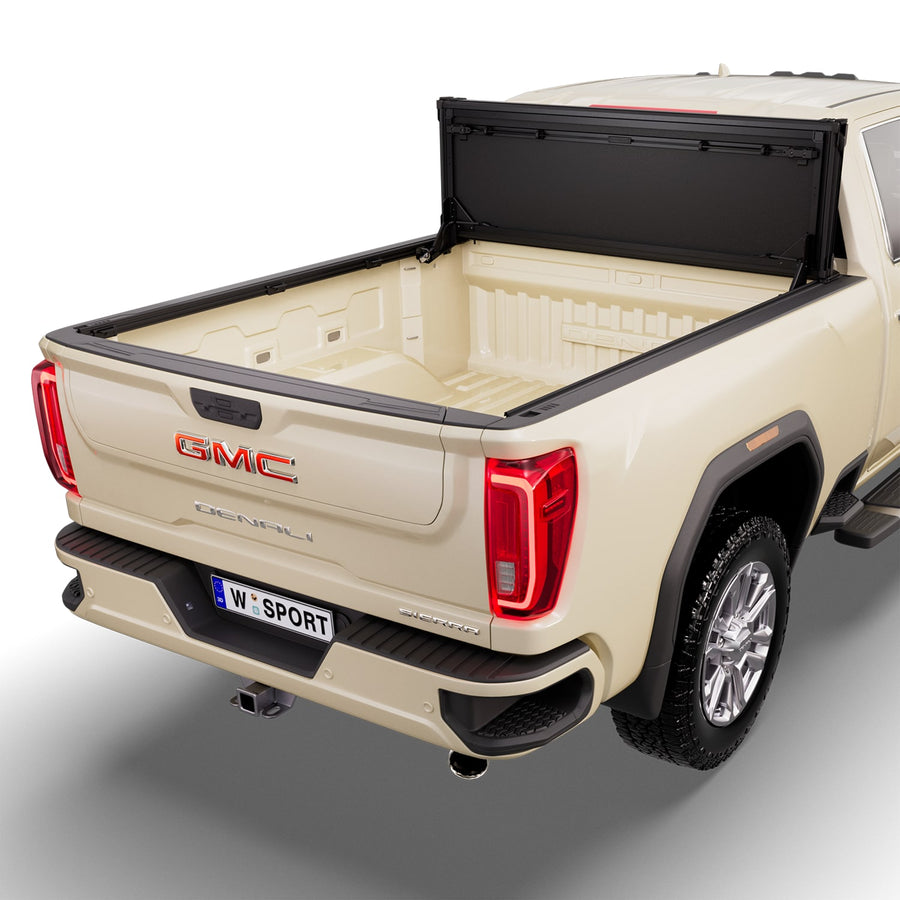Worksport NEXUS hard folding tonneau cover folded and flipped up behind the cab, the bed open
