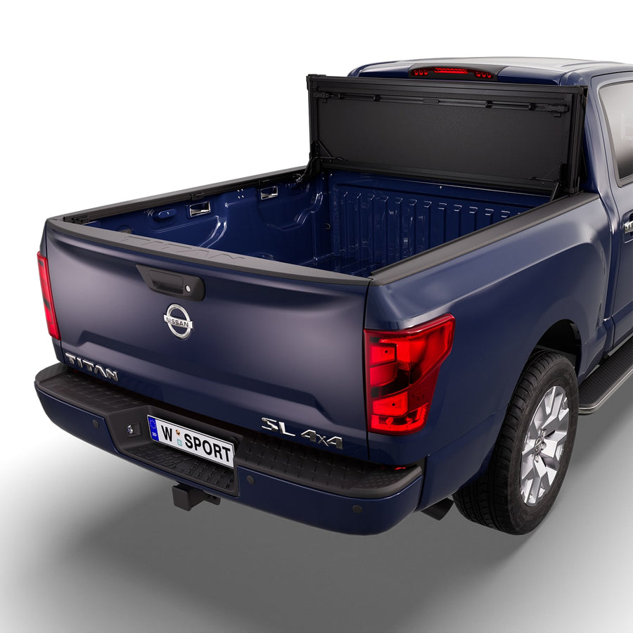Worksport NEXUS hard folding tonneau cover folded and flipped up behind the cab, the bed open