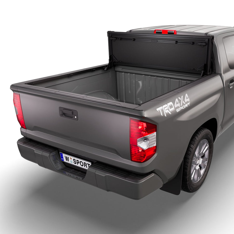 Worksport NEXUS hard folding tonneau cover folded and flipped up behind the cab, the bed open